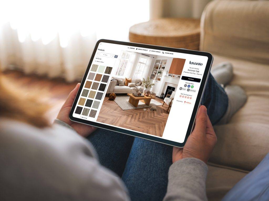 Woman shopping for LVT flooring on a tablet